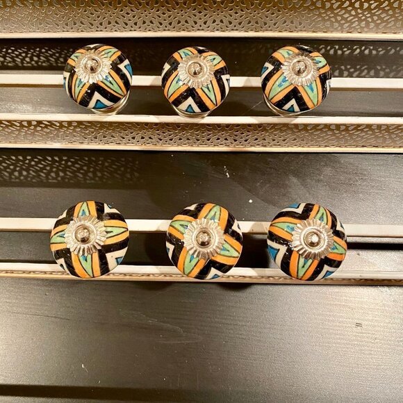 Many new sets of 6 black/orange ceramic pull/knobs - Picture 1 of 6